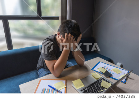 Tired businessman feel headache and stressed about financial problem 74037338