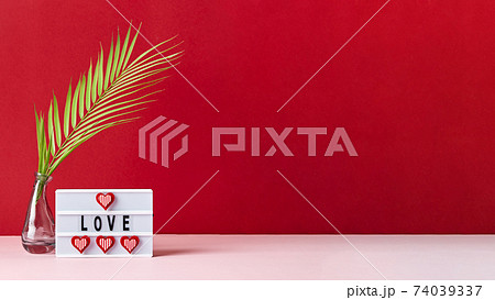 Love lightbox message with red hearts on pink and red background Love lightbox message with red hearts on pink and red background 74039337