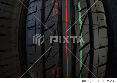 tires of car or vehicle standing in shop tires of car or vehicle standing in shop 74039523