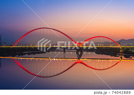 Night scene of New Taipei city by river in taiwan Night scene of New Taipei city by river in taiwan 74042889