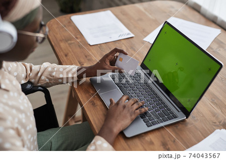 African American Woman paying Online African American Woman paying Online 74043567