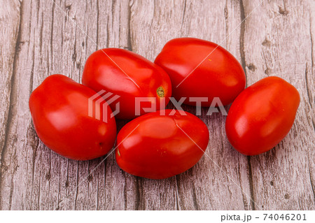 Red bright tasty tomato heap Red bright tasty tomato heap 74046201