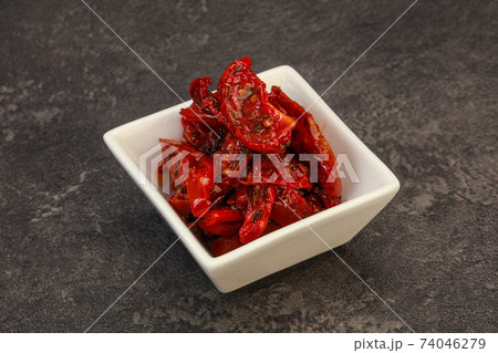 Dried tomato with olive oil Dried tomato with olive oil 74046279