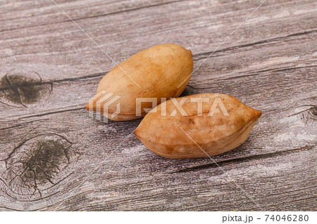 Tasty pecan nut heap isolated Tasty pecan nut heap isolated 74046280
