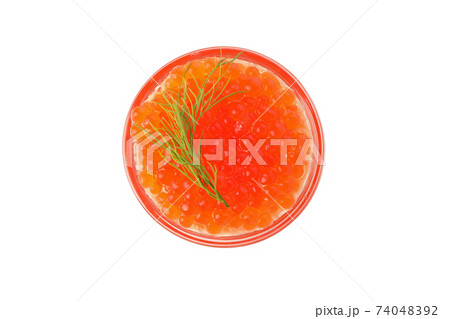Glass bowl with caviar isolated on white background Glass bowl with caviar isolated on white background 74048392