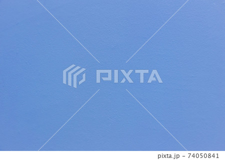 Blue sheet of cardboard paper with rough surface texture background. Blue sheet of cardboard paper with rough surface texture background. 74050841