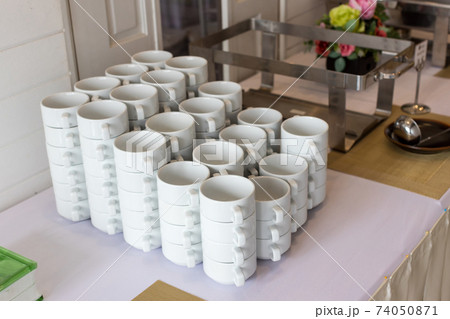 Lots of tea or soup cup. 74050871