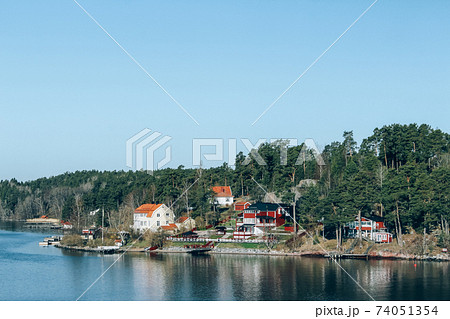 Spring Baltic sea landscape near Stockholm seacost. Local tourism concept, spring nature, selective focus. Sweden nature, authentic archipelago Spring Baltic sea landscape near Stockholm seacost. Local tourism concept, spring nature, selective focus. Sweden nature, authentic archipelago 74051354