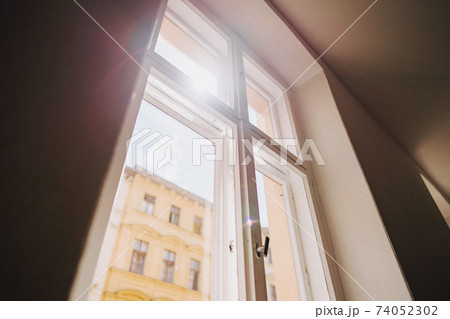 a photo of an old building staircase window 74052302