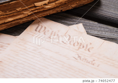 Close-up old ancient book and papers. Close-up old ancient book and papers. 74052477