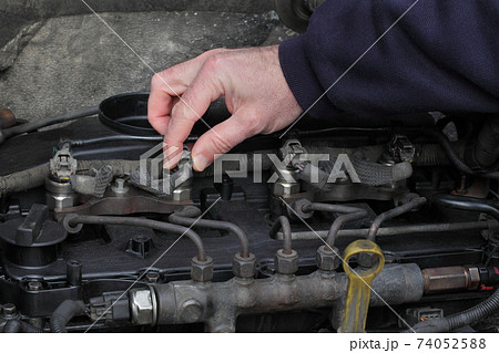 Car mechanic repair electrical connector of common rail diesel engine Car mechanic repair electrical connector of common rail diesel engine 74052588