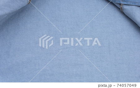 Close up jeans shirt texture. Close up jeans shirt texture. 74057049