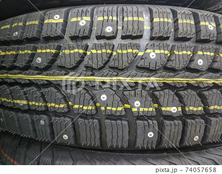 winter studded tires for a car new close-up 74057658