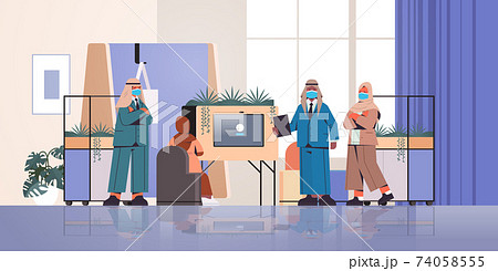 arabic businesspeople in masks making presentation in creative coworking center coronavirus pandemic teamwork arabic businesspeople in masks making presentation in creative coworking center coronavirus pandemic teamwork 74058555