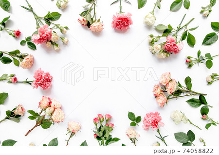 frame made of beautiful pink roses and eucalyptus branches on a white background. The apartment lay, top view. Floral frame. Frame of flowers. frame made of beautiful pink roses and eucalyptus branches on a white background. The apartment lay, top view. Floral frame. Frame of flowers. 74058822