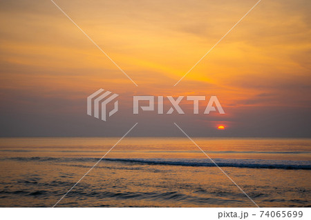 beautiful sunset at the beach in Thailand 74065699