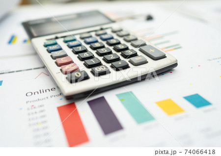 Calculator on graph paper. Finance development, Banking Account, Statistics, Investment Analytic research data economy, Stock exchange trading, Business company concept. 74066418