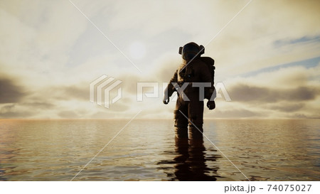 Spaceman in the sea under clouds at sunset 74075027