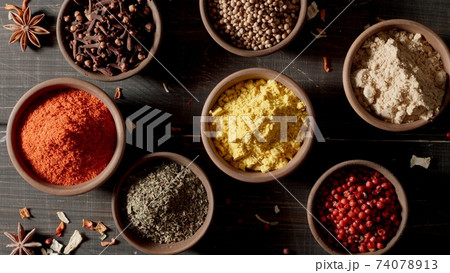 TOP VIEW: Spices and herbs. Variety of colourful seasoning. 74078913