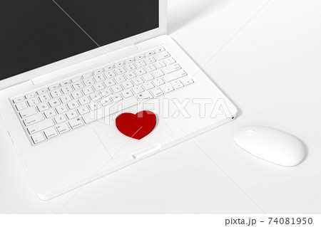 White computer keyboard button of labtop with red heart sign symbol 3d rendering. 3d illustration Internet dating of Love and Valentines Day greeting card template minimal concept. 74081950