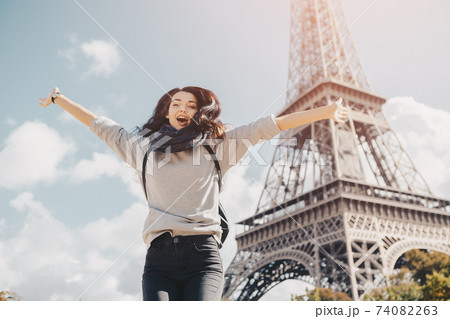 Woman Against Eiffel Tower in Paris, France Woman Against Eiffel Tower in Paris, France 74082263
