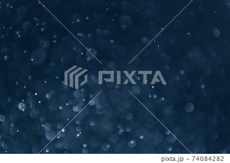 Abstract blue bokeh background. 74084282