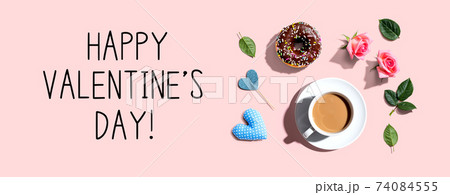 Valentines Day message with a cup of coffee and a donut 74084555