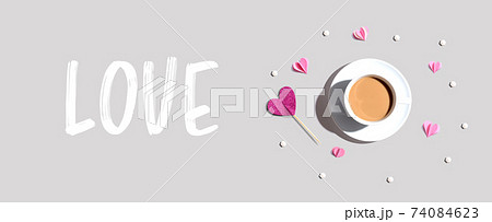Love message with a cup of coffee and paper hearts 74084623