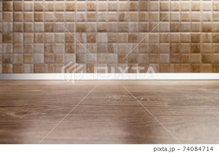 wooden desk space and tiles home background with copy space 74084714
