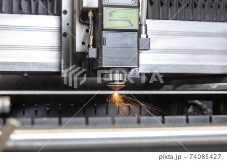 Programmable machine for laser cutting of metal. Sparks from laser cutting, Programmable machine for laser cutting of metal. Sparks from laser cutting, 74085427
