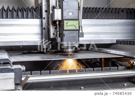 Programmable machine for laser cutting of metal. Sparks from laser cutting, Programmable machine for laser cutting of metal. Sparks from laser cutting, 74085430