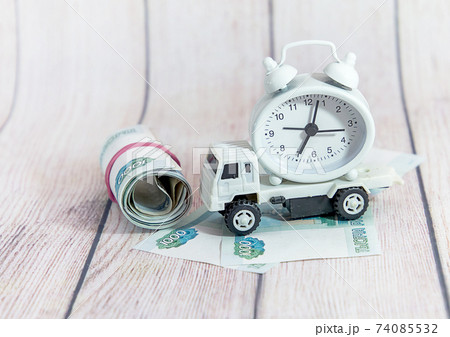 Children's car, money and watch. Compliance with commercial cargo transportation laws Children's car, money and watch. Compliance with commercial cargo transportation laws 74085532