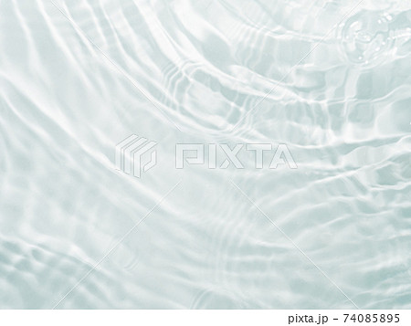 Ripple water texture with shadows on white 74085895