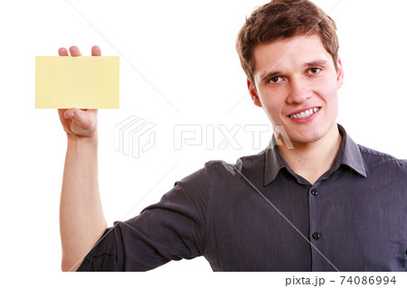 Young man with piece of paper. Young man with piece of paper. 74086994
