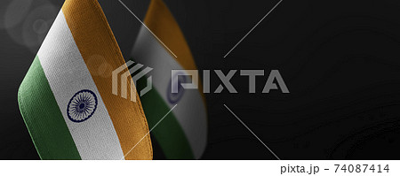 Small national flags of the India on a dark background Small national flags of the India on a dark background 74087414