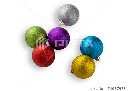 Christmas balls isolated on white background. Several christmas balls close-up on a white background. 74087973