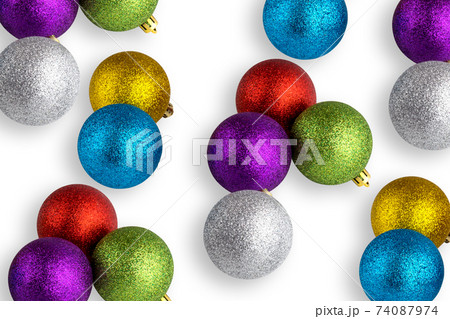 Christmas balls isolated on white background. Several christmas balls close-up on a white background. 74087974