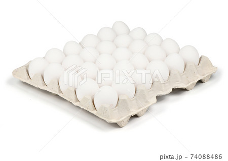 30 farm fresh white eggs in a tray isolated on white 74088486