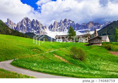 Alpine scenery - small village in Dolomites mountains, Italy 74088759