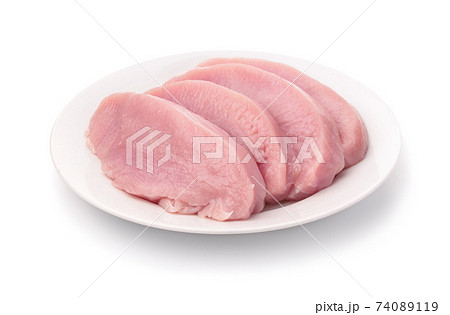 Fresh raw turkey meat fillet on ceramic plate 74089119