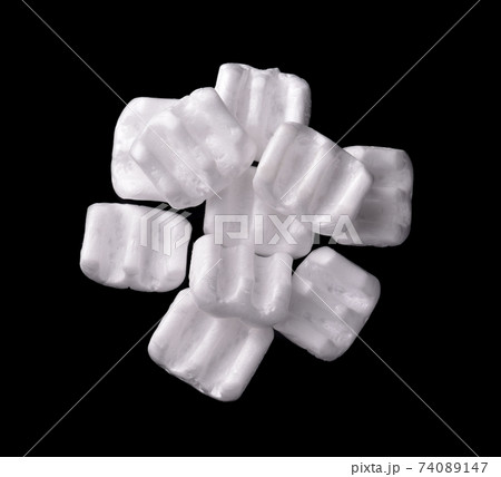Top view of of m-shaped styrofoam packing chips Top view of of m-shaped styrofoam packing chips 74089147