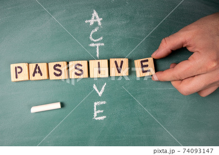 Passive and Active. Text from letters of the wooden alphabet Passive and Active. Text from letters of the wooden alphabet 74093147