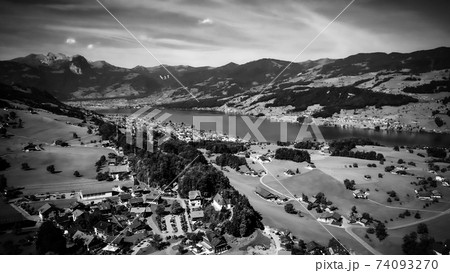Typical landscape in Switzerland - the Swiss Alps in black and white Typical landscape in Switzerland - the Swiss Alps in black and white 74093270