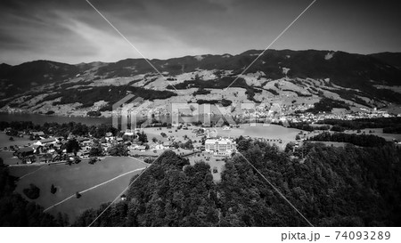 Typical landscape in Switzerland - the Swiss Alps in black and white 74093289