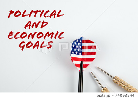 Political and economic goals. Darts with the flag of the united states of america on a white 74093544
