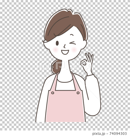 Female wink in an apron OK pose 74094303