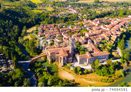 Aerial view of Rieux-Volvestre town overlooking Cathedral, France Aerial view of Rieux-Volvestre town overlooking Cathedral, France 74094591