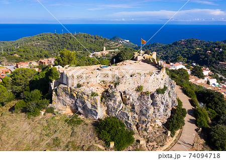 Bird's eye view of ruined rock fortress scenic view in Begur, Catalonia 74094718
