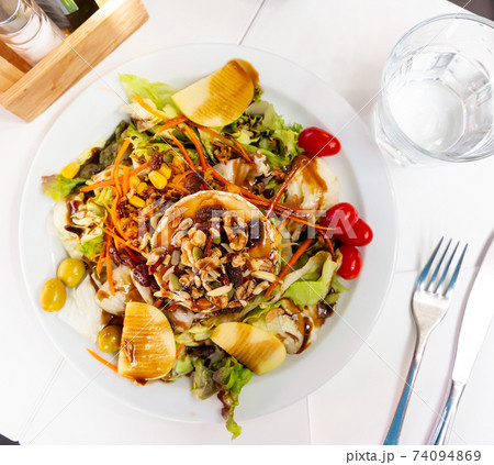 Portion of goat cheese salad Portion of goat cheese salad 74094869