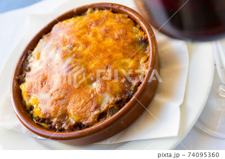 Baked minced meat with cheese 74095360